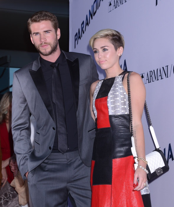 Miley Cyrus shows her support for Liam at the premiere of his movie ''Paranoid''. Miley Cyrus shows her support for Liam at the premiere of his movie ''Paranoid''.